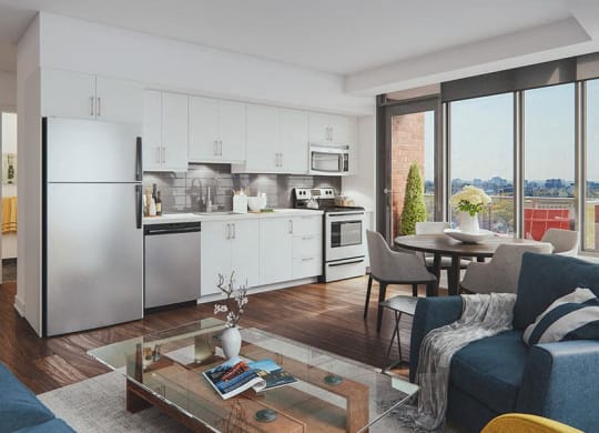 a living room with a kitchen and a table