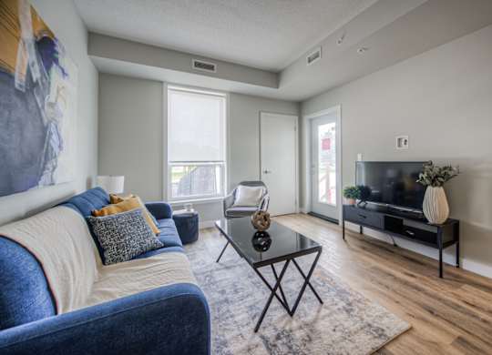 a living room with a couch and a coffee table