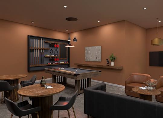 A room with a pool table and a couch.