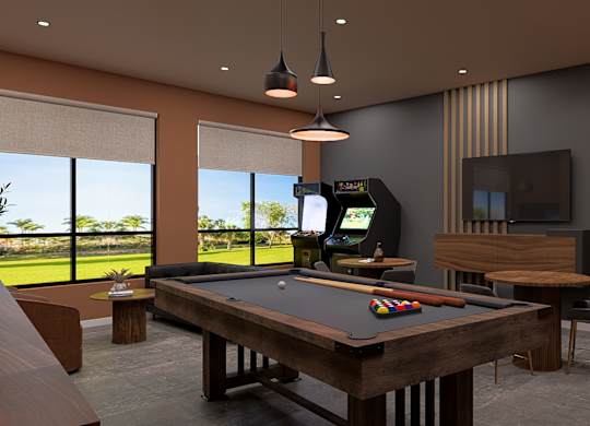 A room with a pool table and a television.