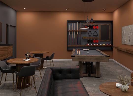 A room with a pool table, a television, and a bar area.