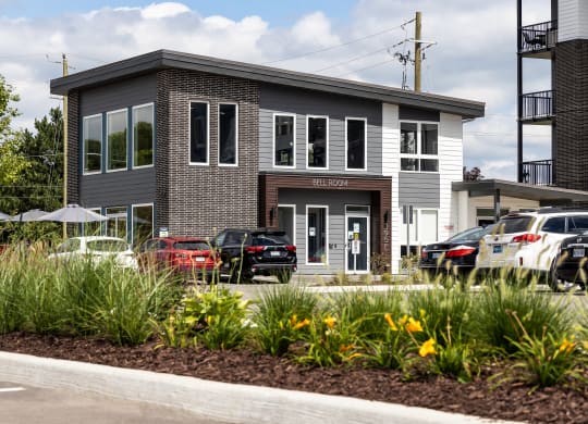a building with a parking lot in front of it