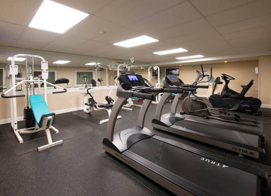 a gym with treadmills and other exercise equipment at Monroeville Apartments, Monroeville, PA, 15146