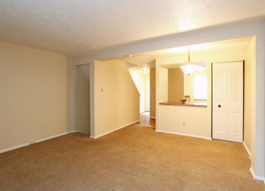 an empty living room at Monroeville Apartments, Monroeville