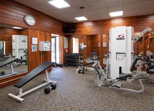 a room filled with lots of exercise equipment at Monroeville Apartments, Monroeville, Pennslyvania