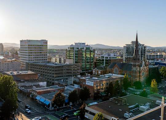 A cityscape with a church and other buildings.