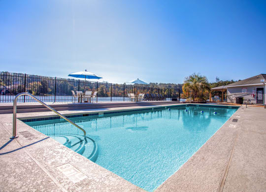 our resort style swimming pool is open to the community and has a fence around it