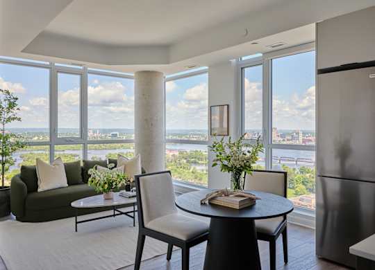 A modern living room with a view of the city.