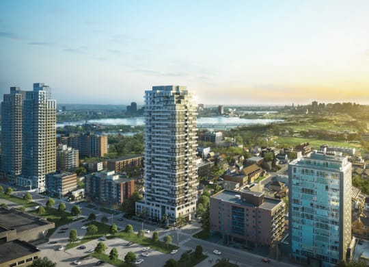 an aerial view of a city with tall buildings and a river