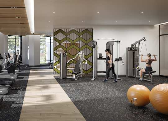 A gym with people working out and exercise equipment.