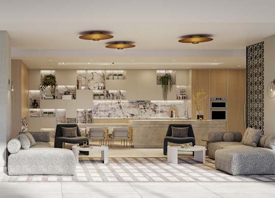 A modern living room with a kitchen in the background.