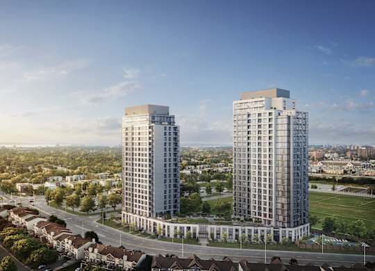 Two modern high-rise buildings are situated in a green, tree-filled urban area.