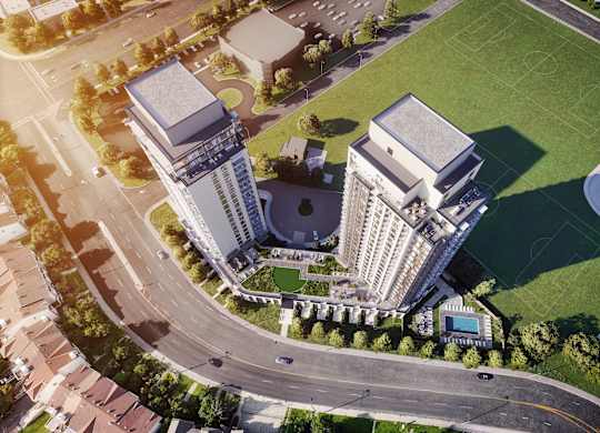 A large building with a pool in front of it.