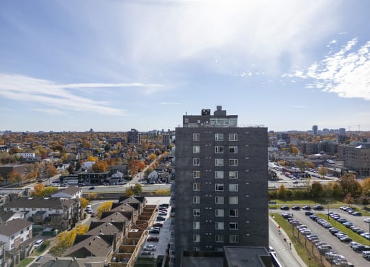 the view of the city from the top of a tall building
