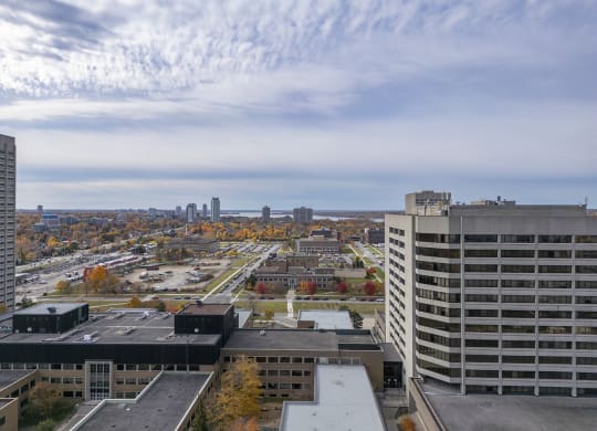 the view of the city from the top of a building
