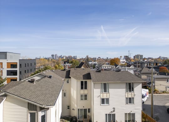 the view of the city from the roof of a house