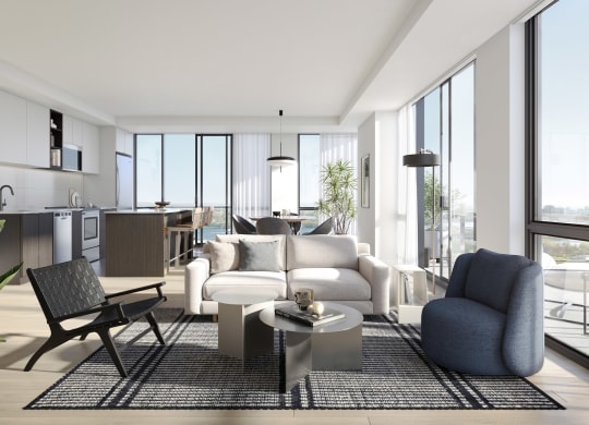 a living room with a couch and a chair and a table