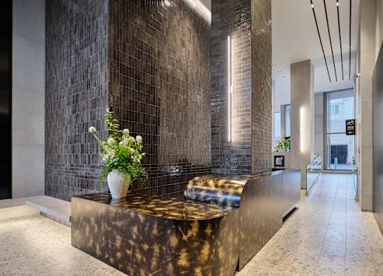 A reception area with a marble counter