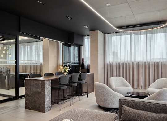 A modern living room with a bar area