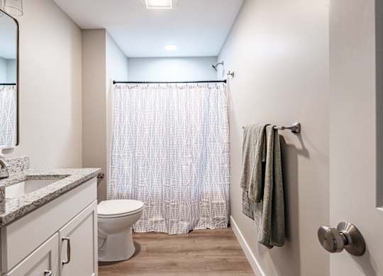 Bathroom with shower and vanity at Windham Village Apartments, Windham, Maine