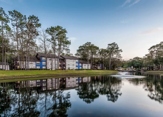 a view of a lake near a building  at Northlake Apartments, Jacksonville, Florida