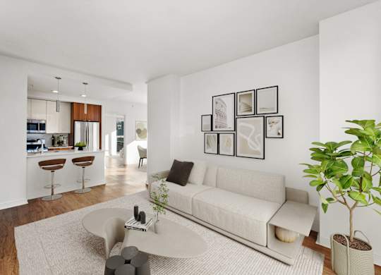 A living room with a white couch and a coffee table at Chateau on Wells, Chicago