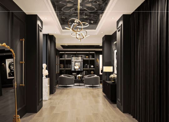 a lobby with black walls and a white marble floor at Chateau on Wells, Chicago