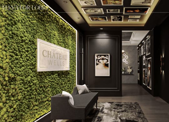 a living wall with green plants and a chair in a lobby at Chateau on Wells, Chicago, 60654