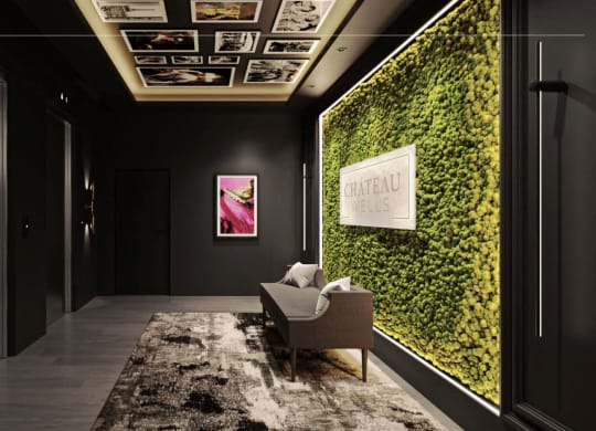 a living wall of moss in a lobby with a chair at Chateau on Wells, Illinois, 60654