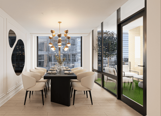 a dining room with a black table and white chairs and a large window at Chateau on Wells, Chicago, 60654