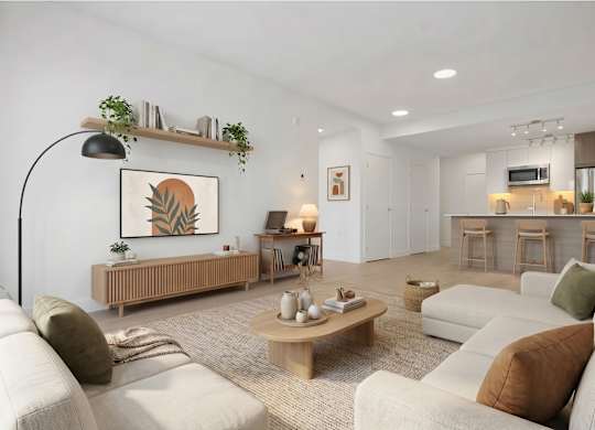 A living room with a white couch, a wooden coffee table, and a painting on the wall.