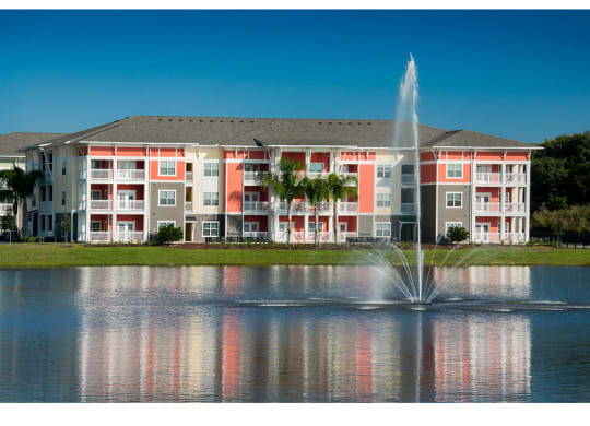 Building Exterior and lake with fountain
