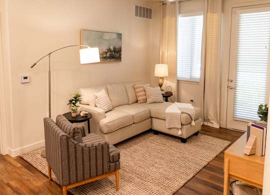 Four Seasons Logan Apartments and Townhomes Cozy Living Room