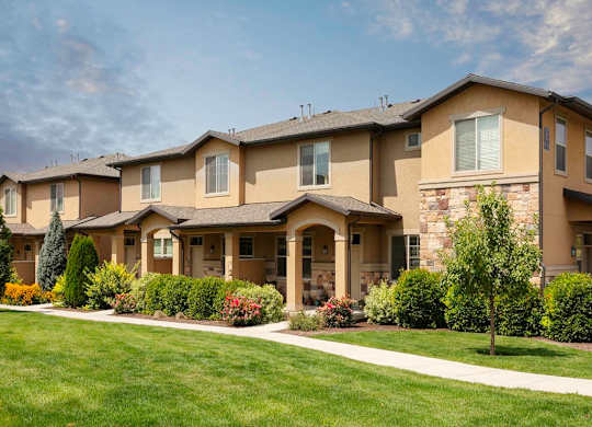 Four Seasons Apartments and Townhomes Grassy Area in Front of Homes