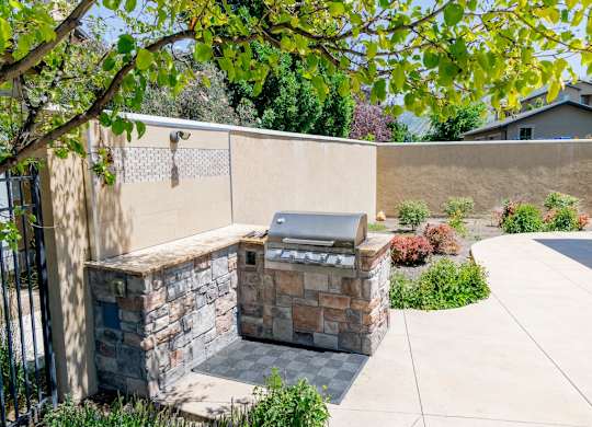 Four Seasons Logan Apartments and Townhomes Outdoor BBQ Area