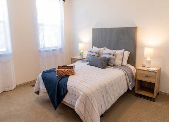 Four Seasons Logan Apartments and Townhomes Comfy Bedroom