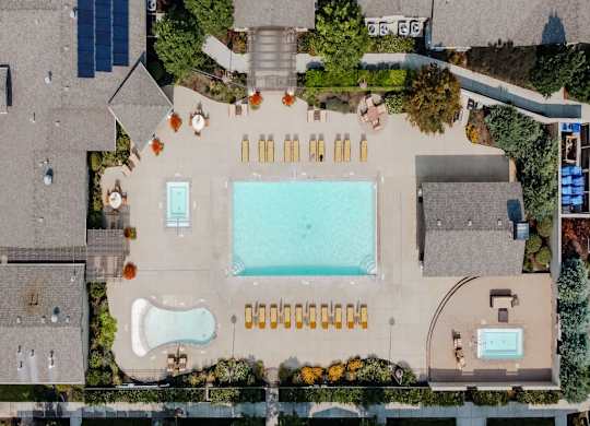 Four Seasons Apartments and Townhomes Drone View of Pool