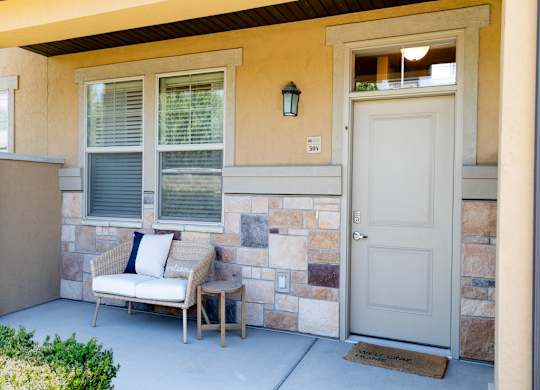 Four Seasons Logan Apartments and Townhomes Front Door with Decoration