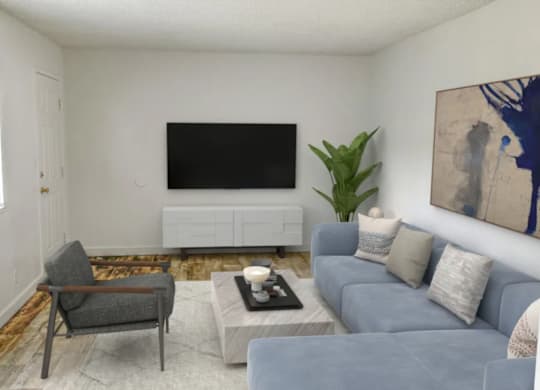 A living room with a grey couch, a chair, a coffee table, and a painting on the wall.