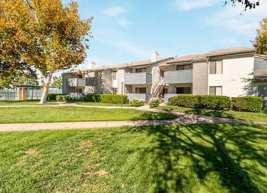 A sunny day at a well-kept apartment complex at Chaparral Apartments, Palmdale, CA, 93551