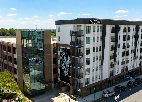 A modern building with the word NOVI on the side.