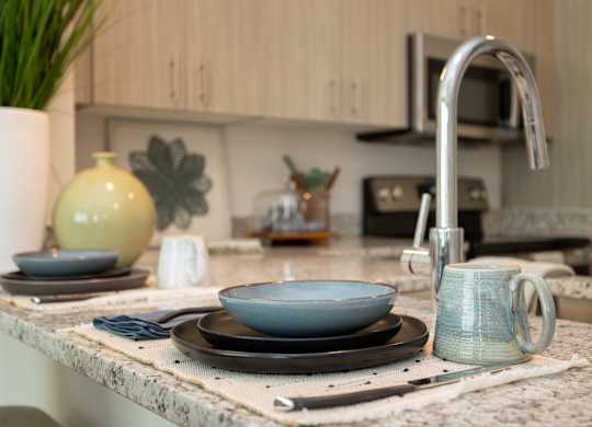 Modern kitchen at NOVI at Concord - luxury apartments in Concord, NC
