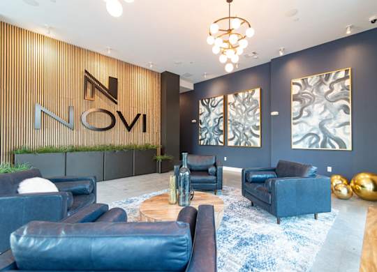 Guests and residents alike enjoy gorgeous common areas, including the stunning entrance lobby of Novi Flats in Concord, NC