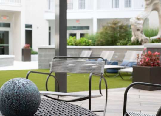 Detail of the outdoor lounging area at Novi Rise Apartments in Concord, NC