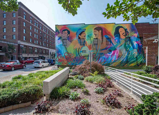 Mural of folk rock band, The Avett Brothers, in downtown Concord, NC