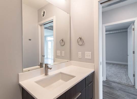 Looking into a bedroom from a bathroom