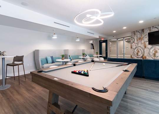 Billiards are available at Novi Rise's game room
