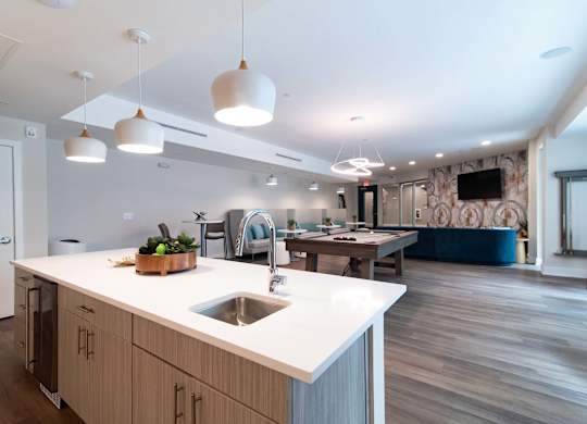 With a fully equipped kitchen, Novi Rise's resident lounge is the perfect place to host a party