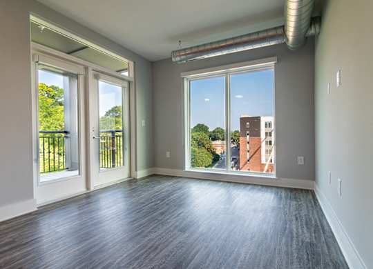 Floor-to-ceiling windows at Novi Flats in Concord, NC