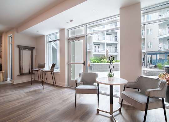 Novi Rises' resident lounge offers direct access to the community's courtyard